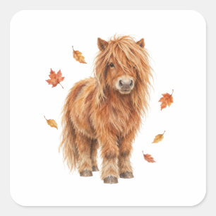 Sticker Carré Poney des Highlands dans des feuilles tombantes