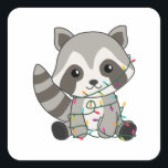 Sticker Carré Raccoon Christmas Snow Winter Raccoons<br><div class="desc">The racon to softness with fairy lights. Funny animals with gifts and snow to the holidays. Also funny for Christmas in July. Raccoons are sweet animals and perfect for Christmas.</div>