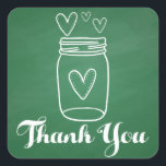 Sticker Carré Rustique Mason Jar Green Merci Chalkboard<br><div class="desc">Dites merci avec ces mignons stickers en bocal de mason rustique. Ce charmant autocollant de style champêtre présente un pot en maçon blanc dessiné à la main avec de mignons coeurs flottants et un remerciement imprimé dans une police en écriture blanche surlignée sur un tableau vert vintage. Les autocollants de...</div>