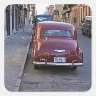 Sticker Carré Une voiture Peugeot rouge classique ancienne garée