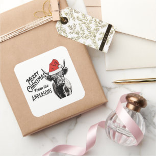 Sticker Carré Vache Highland de Noël avec chapeau de Santa