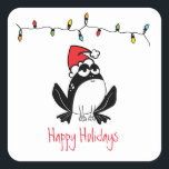 Sticker Carré Whimsical Christmas Frog<br><div class="desc">Illustration de grenouille blanche et noire avec chapeau de Père Noël rouge,  chaîne de lumières de vacances et texte personnalisable "Joyeuses Fêtes"</div>