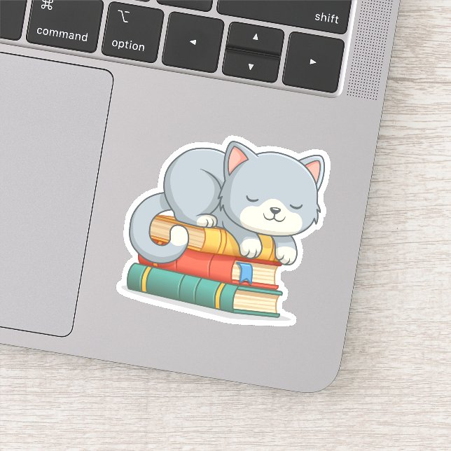 Sticker Chat mignon au-dessus de la pile de livres (Détail)