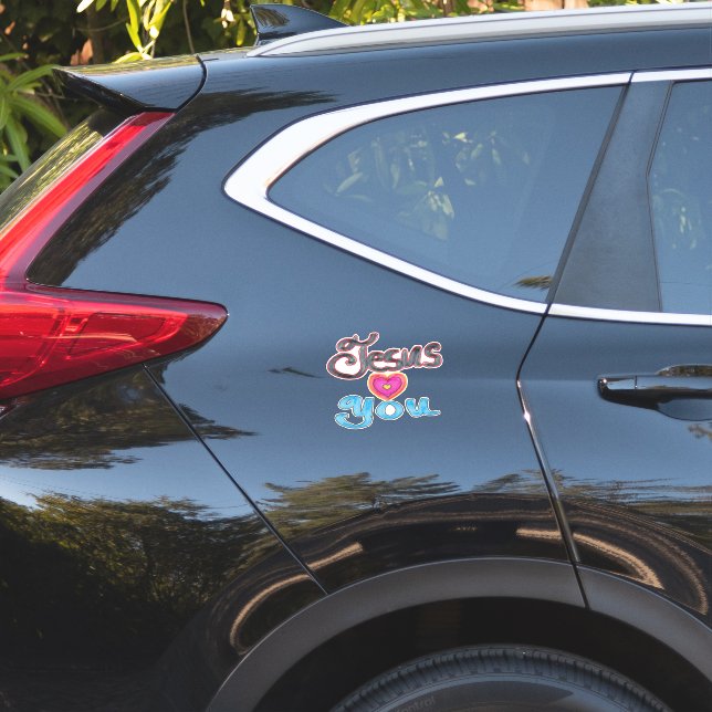 Sticker Citation chrétienne Jésus vous aime Cœur rose  (Dos de voiture)