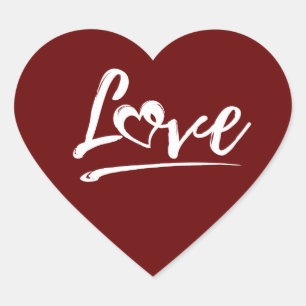 STICKER CŒUR AMOUR AVEC UN CADEAU DE LA SAINT-VALENTIN À COEUR 