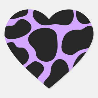 Sticker Cœur Motif d'impression de vache noire et violette.