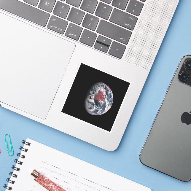 Sticker Croissance plante Sur La Planète Terre. (Ordinateur portable avec iPhone)