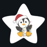 Sticker Étoile Pingouin Christmas Snow Winter Animals Pingouins<br><div class="desc">Le pingouin pour Noël avec des lumières de fées. Animaux amusants avec des cadeaux et de la neige pour les vacances. Aussi drôle pour Noël en juillet. Les pingouins sont des animaux mignons et parfaits pour Noël.</div>