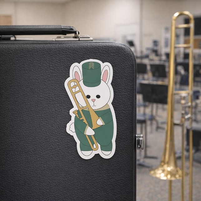 Sticker Fanfare de trombone Lapin vert et or (A sticker of a trombone holding bunny in green & gold marching band uniform.)