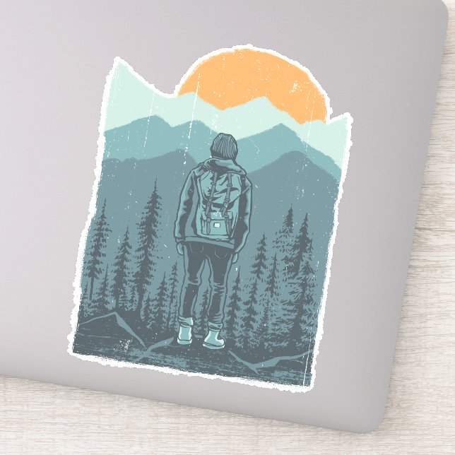 Sticker Femme randonneuse à dossard dans un coucher de sol (Détail)