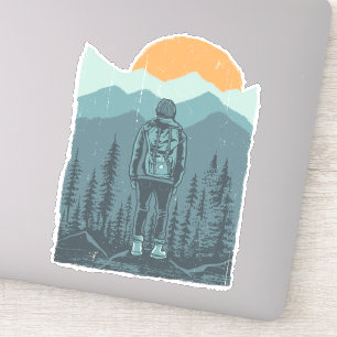 Sticker Femme randonneuse avec sac à dos au coucher de sol
