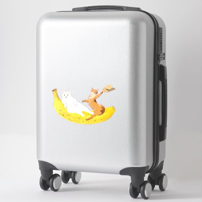Sticker Fraisage de chat sur banane tenant casquette (Sur valise)