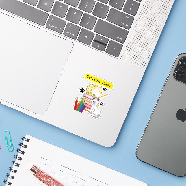 Sticker Le chat aime les livres (Ordinateur portable avec iPhone)