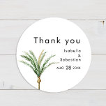 Sticker Merci de mariage de destination Palm Tree<br><div class="desc">Ce palmier destination mariage merci sticker design dispose de palmiers d'aquarelle tropicale sur un arrière - plan blanc éclatant qui évoque l'ambiance rêvée d'un mariage de destination. ce design rayonne l'amour des rivages de sable et des palmiers balançoires, parfait pour les couples à la recherche d'une célébration vraiment inoubliable. Pour...</div>