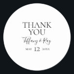 Sticker Merci simple et élégant de mariage Favor<br><div class="desc">Cet autocollant de faveur de mariage simple et élégant est parfait pour votre mariage moderne minimaliste noir et blanc. Le design comporte une police contemporaine minimale accompagnée d'une calligraphie formelle. Gardez-le tel quel,  ou choisissez de le personnaliser avec vos propres oeuvres d'art ou photos !</div>