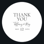 Sticker Merci simple et élégant de mariage Favor<br><div class="desc">Cet autocollant de faveur de mariage simple et élégant est parfait pour votre mariage moderne minimaliste noir et blanc. Le design comporte une police contemporaine minimale accompagnée d'une calligraphie formelle. Gardez-le tel quel,  ou choisissez de le personnaliser avec vos propres oeuvres d'art ou photos !</div>