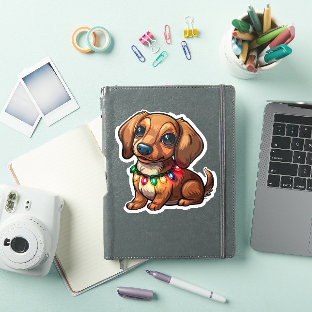 Sticker Mischievous Dachshund enveloppé dans les lumières  (Couverture iPad)
