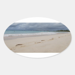 Sticker Ovale Empreintes de pas en plage de sable