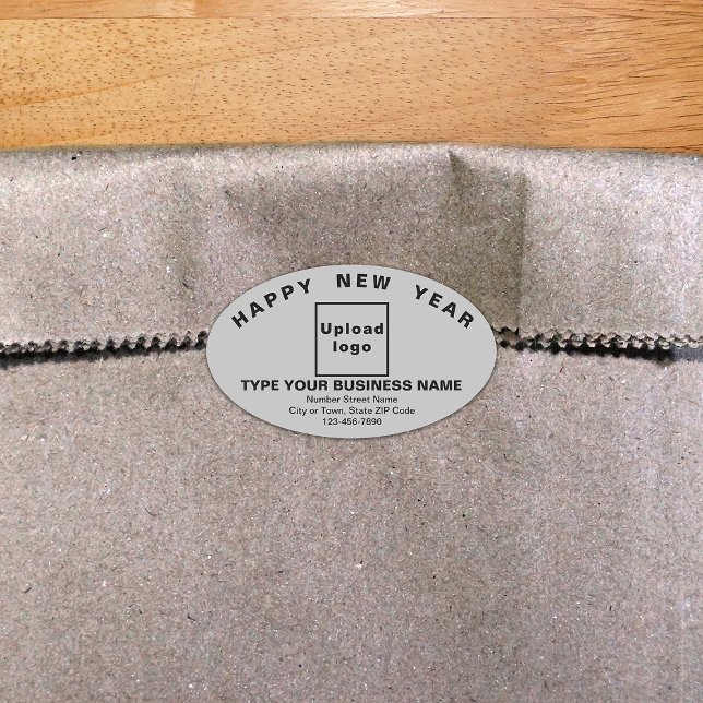 Sticker ovale gris pour le Nouvel An (New Year greeting with your business brand on gray oval shape sticker.)