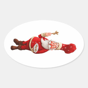 Sticker Ovale Le père noël fait des bonhommes en pain d'épice