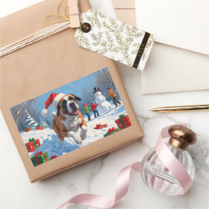 Sticker Rectangulaire Cane Corso courant dans la neige avec un chapeau d