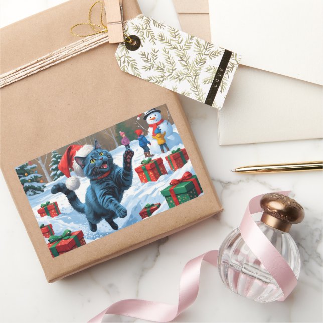 Sticker Rectangulaire Chat Bleu Russe Courant dans la Neige avec un Chap (Cadeaux)