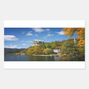 Sticker Rectangulaire Le lac a saigné avec des arbres dans des couleurs