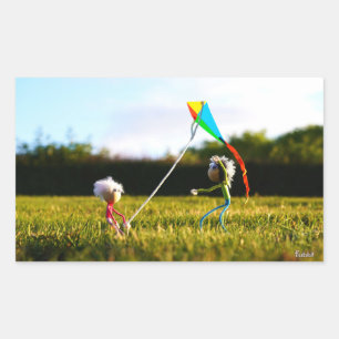 Sticker Rectangulaire Les Fubby qui jouent ensemble avec un cerf-volant.