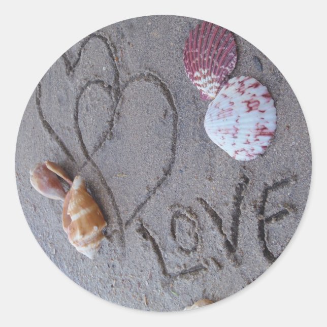 Sticker Rond 2 Coeurs dans le sable avec des coquilles avec Amo (Devant)