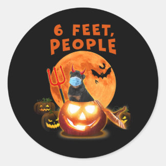 Sticker Rond 6 feet, people rottweiler dog witmask halloween