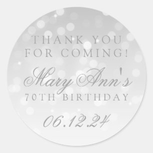 Sticker Rond 70e anniversaire Merci Argent Bokeh Feu d'étincell