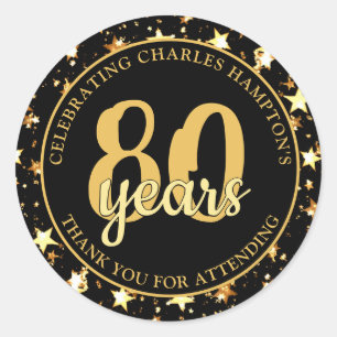 Sticker Rond 80e Anniversaire Étoiles Noires et Dorées MERCI