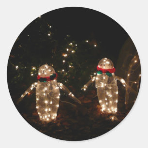 Sticker Rond Affichage de lumières de vacances des pingouins