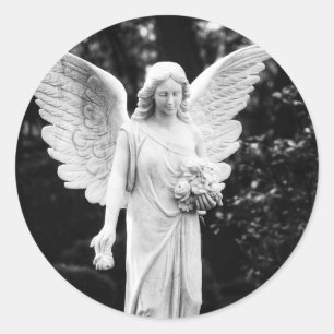 Sticker Rond Angel tenant des fleurs noir et blanc photo