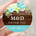Sticker Rond Aqua Floral Lights Rustic Merci Mariage<br><div class="desc">Aqua Floral String éclaire Rustique Merci Mariage Classic Round Sticker. Ce design est composé d'un arrière - plan rustique en bois avec des fleurs vert d'aqua et de menthe agrémentées de lampes à cordes scintillantes. Parfait pour un mariage campagnard d'hiver ou de printemps.</div>