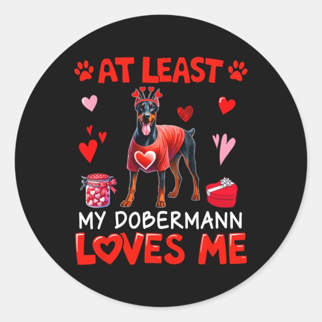 Sticker Rond Au moins mon Dobermann m'aimant Saint-Valentin Cél (Devant)