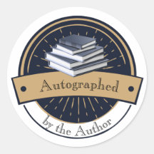 Autographié par l'auteur, pile de livres