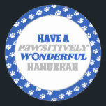 Sticker Rond Ayez une Hanoukka Merveilleuse et louable<br><div class="desc">Voici notre délicieux design Hanoukka avec une charmante bordure d'empreintes de pattes blancs sur un arrière - plan bleu. Embrassez l'esprit festif d'Hanoukka avec ce design, qui enferme un arrière - plan blanc propre présentant le texte sincère "Ayez une Hanoukka merveilleuse de beauté pawsitive". Le texte est présenté dans les...</div>
