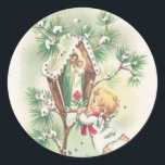 Sticker Rond Baby Jesus Manger Christmas Bells Ribbon<br><div class="desc">Belle image vintage de la Bienheureuse Mère et Bébé Jésus dans un sanctuaire d'arbre. Un petit ange leur apporte un rose.</div>