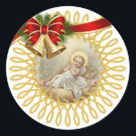 Sticker Rond Baby Jesus Manger Christmas Bells Ribbon<br><div class="desc">Belle image du Bébé Jésus couché dans la crèche. Les cloches de Noël et le ruban accentuent l'image.</div>
