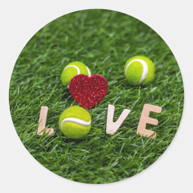 Sticker Rond Balle de tennis avec amour sur l'herbe verte (Devant)