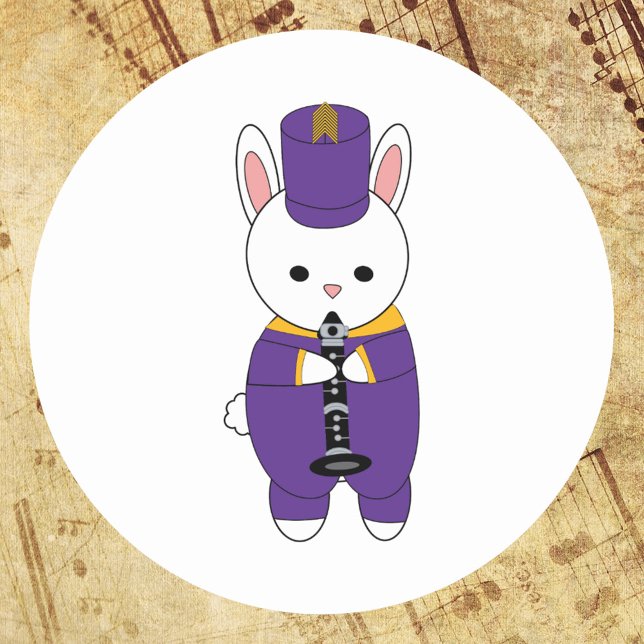 Sticker Rond Bande de Marquage Lapin Clarinet Puprle Jaune (A sticker of a clarinet playing bunny rabbit in a purple and yellow gold marching band uniform.)