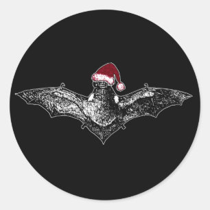 Sticker Rond Batte dans un casquette de Père Noël