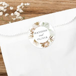 Sticker Rond Beau Boho Botanical Wedding Favor<br><div class="desc">Ce modèle rustique mais élégant d'autocollant de faveur présente de belles botaniques d'aquarelle et une typographie élégante. Ce design chic est un excellent choix pour de nombreux styles d'événements, du classique au boho. Des étiquettes customisés font un merveilleux ajout à votre réception de mariage ou à votre décor de douche...</div>