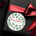 Sticker Rond Beau Red Green Holly Berry Custom Christmas<br><div class="desc">De beaux feuilles vert aquarelle aux baies rouges saintes décorent ces adorables stickers de Noël de famille. Personnalisez le script festif des fêtes rouges avec votre nom de famille au centre de ce magnifique motif botanique.</div>