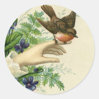 Sticker Rond Beautiful hand with a bird and flowers
