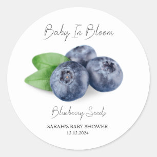 Sticker Rond Bébé dans le Baby shower de graines de bleuet en f
