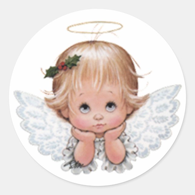 Sticker Rond Bébé de Noël mignon tête d'ange dans les mains (Devant)