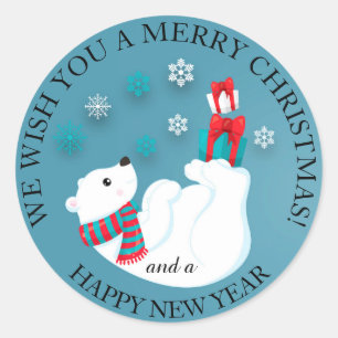 Sticker Rond Bébé ours polaire jouant sur bleu Joyeux Noël