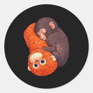 Sticker Rond Bébé singe drôle qui frappe, animal mignon hommes
